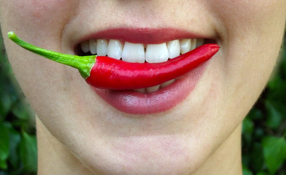Lady having chili on her lips