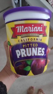 Holding Mariani California Pitted Prunes