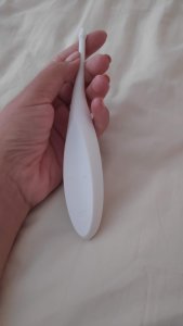 Holding White Twirling Fun by Satisfyer